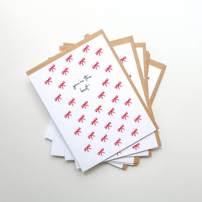 greeting cards with text 'you're the best' and illustration of a bow pattern